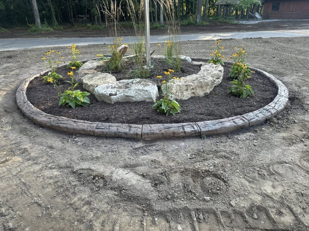 concrete curbing in hand hewn wood grain stamp